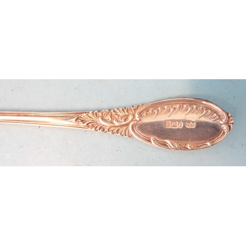 382 - A pair of Edwardian silver serving spoons with floral-embossed gilt bowls, Mappin & Webb, Sheffi... 