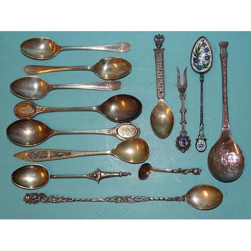 384 - A Plymouth souvenir silver coffee spoon with Eddystone lighthouse finial, seven other silver spoons,... 