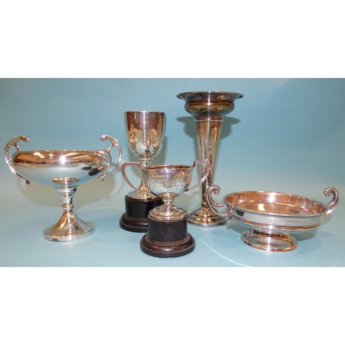 387 - Three various silver trophy cups, a small silver tazza, 6cm high and a silver spill vase with loaded... 