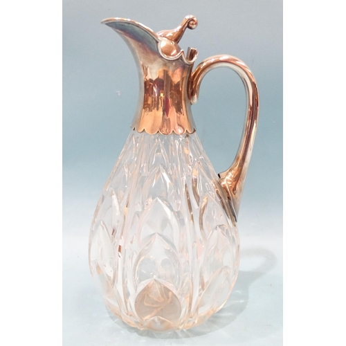 389 - A late-Victorian cut-glass and silver-mounted claret jug, the ovoid body with cut arabesques, the hi... 