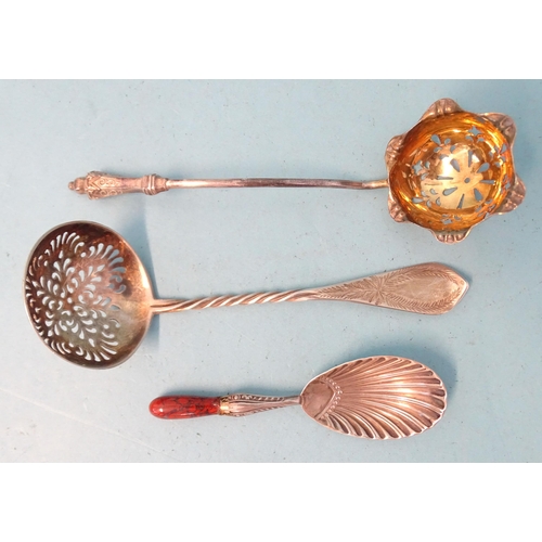 404 - A Victorian silver-gilt sifter spoon, Martin & Hall, Sheffield 1892, another with twisted stem, ... 