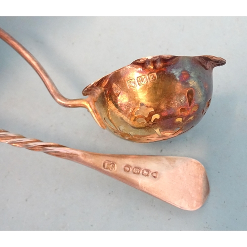 404 - A Victorian silver-gilt sifter spoon, Martin & Hall, Sheffield 1892, another with twisted stem, ... 