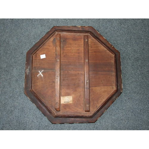 48 - An Indian hardwood octagonal folding table inlaid with ivory and bone depicting profuse foliate deco... 