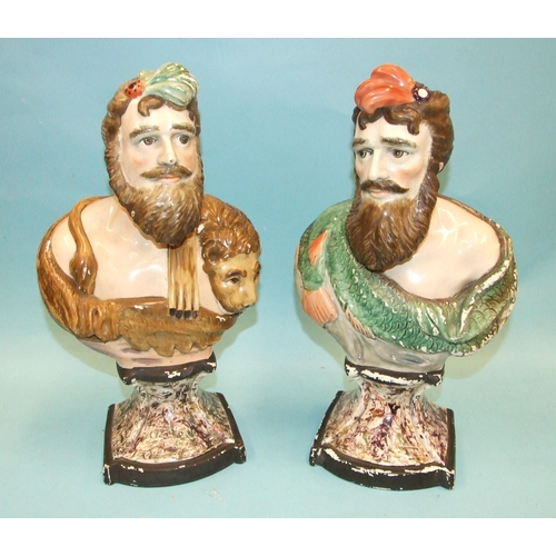 93 - A pair of 19th century pearlware painted busts depicting Neptune and Hercules, on marble-effect base... 