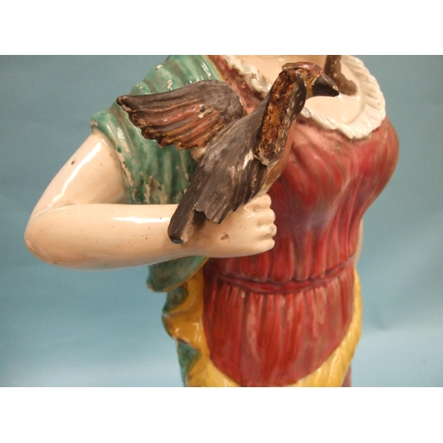 94 - A large 19th century Staffordshire glazed earthenware figure of a Greek goddess with a bird perched ... 