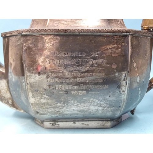 328 - A silver teapot of octagonal form bearing the inscription Presented to Professor T. Turner by his Co... 