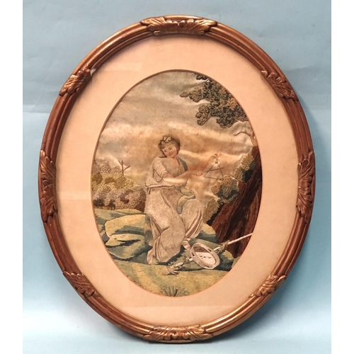 76 - An 18th/19th century oval needlework picture of a woman contemplating in a landscape, 32 x 24cm and ... 