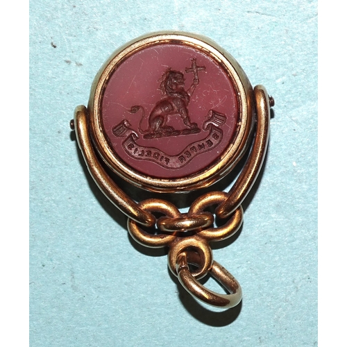 157 - An 18ct gold-mounted swivel fob with compass and hardstone engraved 