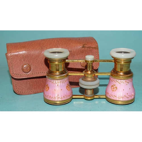 316 - Asprey, a pair of gilt metal, pink and gold guilloche-enamel opera glasses with mother-of-pearl fitt... 