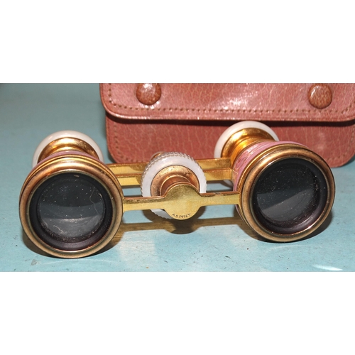 316 - Asprey, a pair of gilt metal, pink and gold guilloche-enamel opera glasses with mother-of-pearl fitt... 