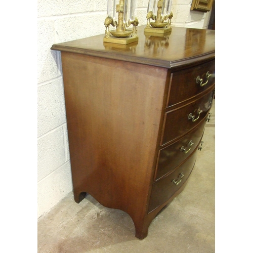 40 - A 19th century mahogany small bow-fronted chest of four long drawers, on splayed bracket feet, 80cm ... 