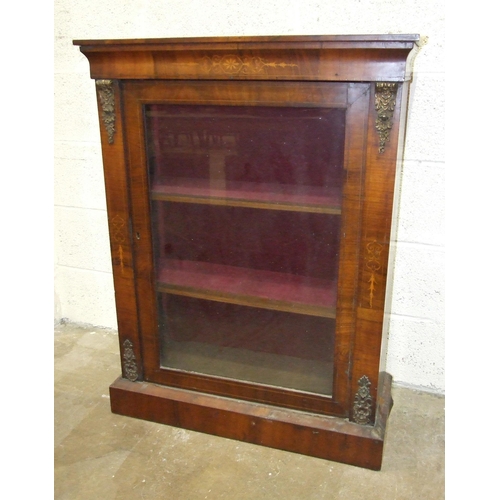 41 - A Victorian inlaid walnut dwarf display cabinet, having a single glazed door and gilt metal mounts, ... 