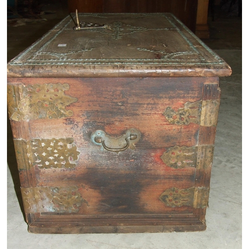 57 - A hardwood Arab chest with studded and cut-brass decoration, 95.5cm wide, 43cm high.... 