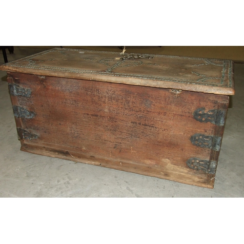 57 - A hardwood Arab chest with studded and cut-brass decoration, 95.5cm wide, 43cm high.... 