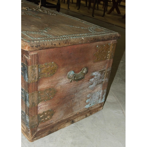 57 - A hardwood Arab chest with studded and cut-brass decoration, 95.5cm wide, 43cm high.... 