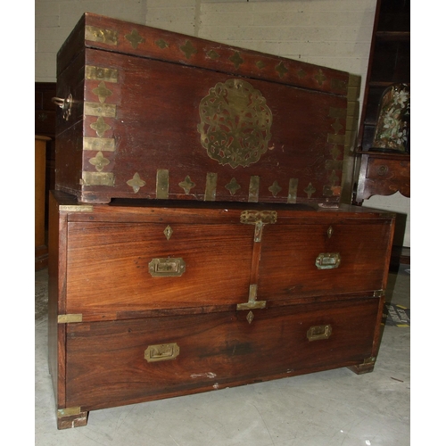 61 - An early-20th century Colonial rosewood and brass-bound military-style chest of two short and one lo... 