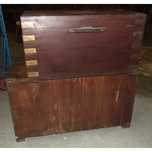 61 - An early-20th century Colonial rosewood and brass-bound military-style chest of two short and one lo... 