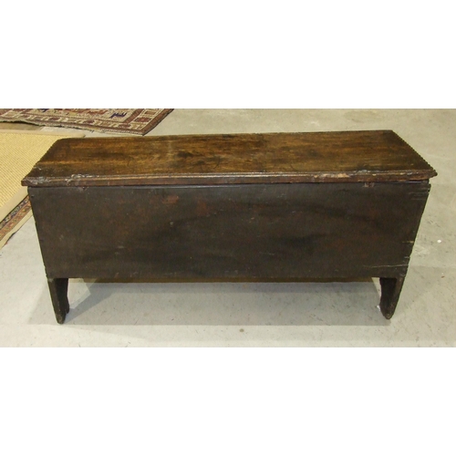 53 - An antique oak six-plank coffer, 102cm wide, 45cm high.