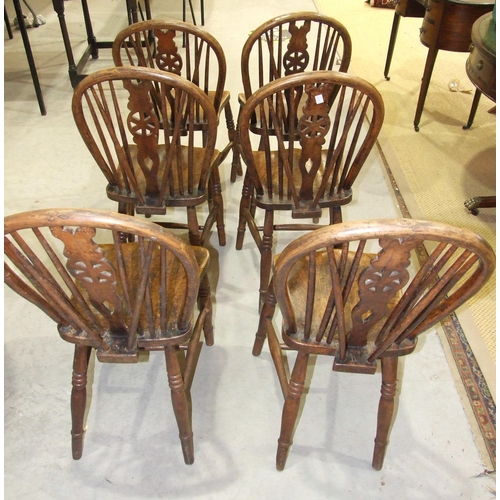 54 - A set of six 19th century elm and beech kitchen chairs, each back with spindles and central splat to... 