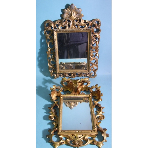 77 - Two 19th century giltwood-framed wall mirrors, each with pierced scrolling foliate frame enclosing a... 