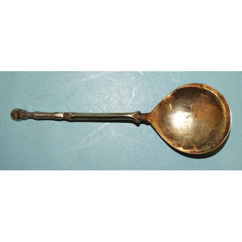 339 - A Dutch silver-gilt spoon with hoof terminal, the bowl engraved with swords on a shield and initials... 