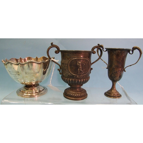 433 - A George V silver two-handled trophy cup decorated in relief with two golfers within oval plaques an... 