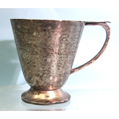 455 - An Arts & Crafts silver hammered mug on circular foot (dented), 8.5cm high, by Albert Edward Jon... 