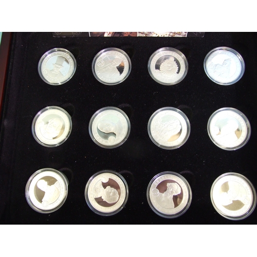 478 - The Royal Mint, a set of twenty-four sterling silver proof £5 crown collection 