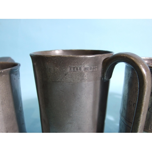 115 - A straight-sided pewter pint tankard engraved F Ellis Jones, Concert Tavern, Flint, 12cm high, (hand... 