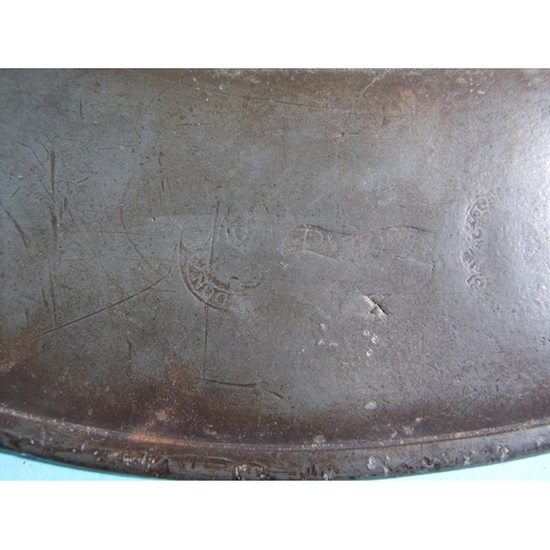 117 - A pair of large pewter chargers marked John Lawrence, 52cm diameter, marked to underside and another... 