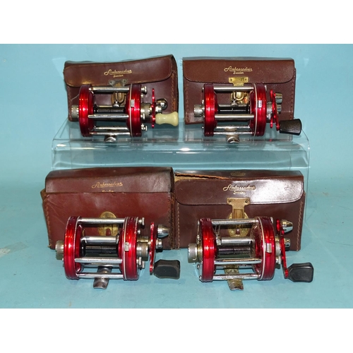 432 - Two Abu Ambassadeur 6000 multiplier reels in leather cases and two others, (worn), in cases, (4).... 