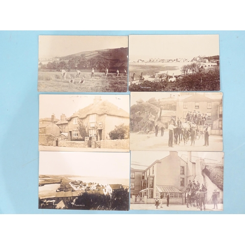 127 - Twenty-one W R Gay RP postcards of Torcross, including one of a whale and fishermen (+ one reproduct... 