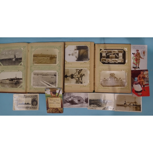 147 - Two albums containing approximately 210 postcards, including many RPs of battleships, submarines and... 