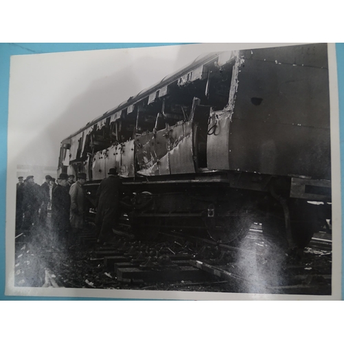 185 - Seven 1930's press photographs, six of which show a derailment of a locomotive, coaches and wagons a... 