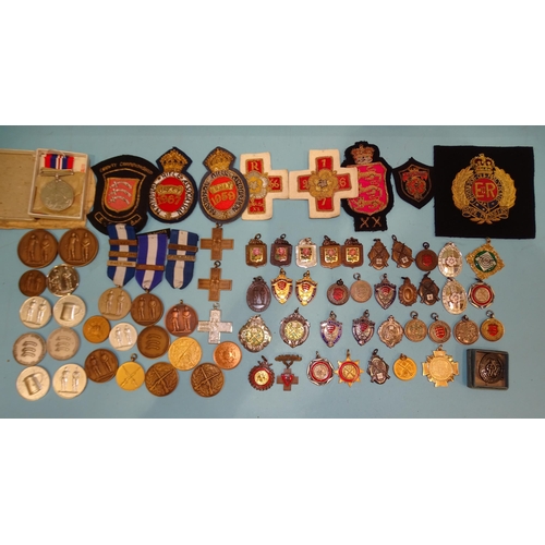 202 - A glazed embroidered panel for the Coldstream Guards, a War Medal 1938-45, in box of issue, eight bu... 