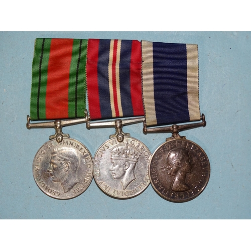 208 - A WWII trio of medals awarded to FX70308 R. G. Meek CAF(E) HMS Daedalus: Defence, War Medal and Long... 