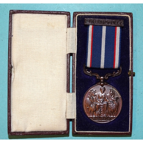 210 - An RSPCA bronze medal for animal life saving awarded to Charles E. Crossman, 1945, with 