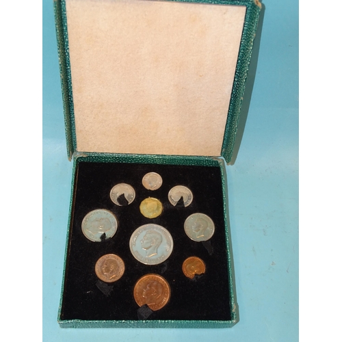 215 - Royal Mint, a 1951 Festival of Britain 10-coin proof set in original green cardboard shagreen-effect... 