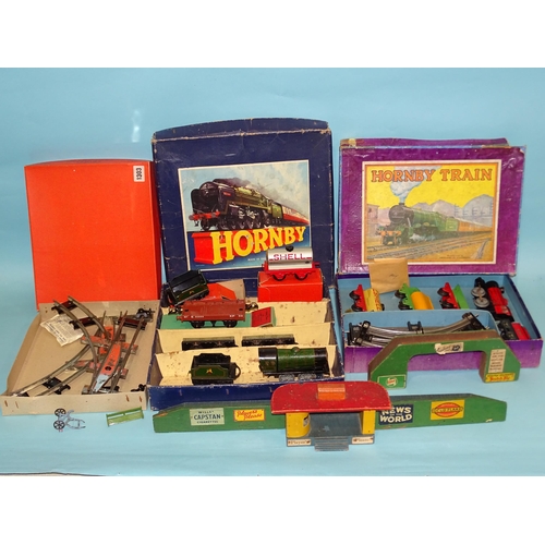 258 - Hornby O gauge, a c/w M.O. Mixed Goods Set, (boxed), a goods part-set, two boxed wagons, a wooden pl... 