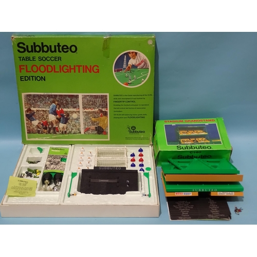 280 - Subbuteo, a boxed Subbuteo floodlighting set, (not complete) and a boxed C140 Stadium Grandstand, (2... 