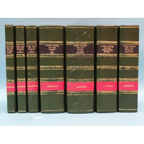 30 - Rowling (JK), all seven volumes of the Harry Potter series rebound in hf green mor gt, with marbled ... 