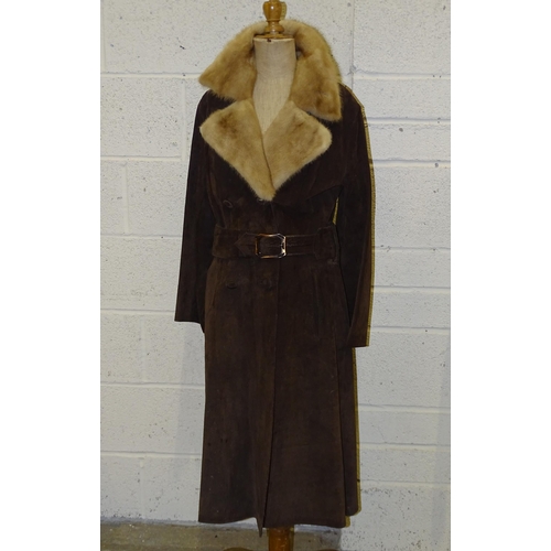 305 - A lady's long brown suede double-breasted coat, belted, with honey-coloured fur collar and lapels, s... 