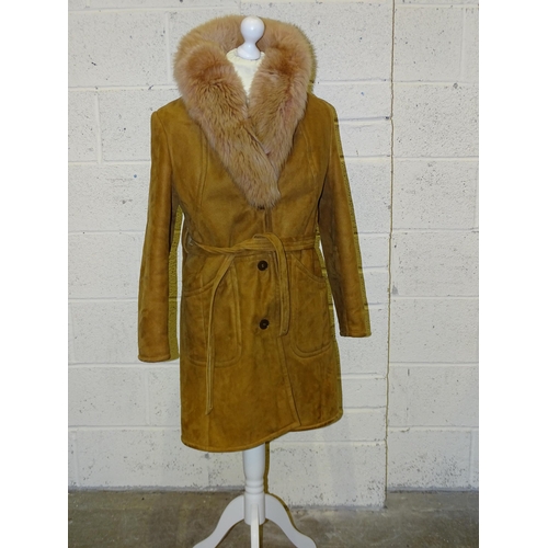 307 - A Tannimpex of Hungary vintage sheepskin coat with pink fur collar, size 36, (appears to be very lit... 