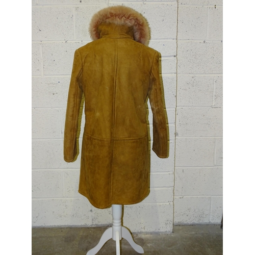 307 - A Tannimpex of Hungary vintage sheepskin coat with pink fur collar, size 36, (appears to be very lit... 