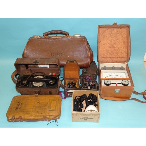 312 - A GPO field telephone, in case, three cased PO meters, a headlamp No.4, a leather wallet and a GPO G... 