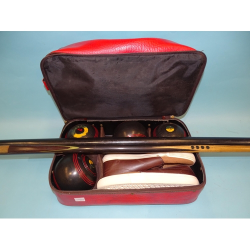 313 - An unnamed one-piece snooker cue, 58½'' long, stamped 18, in plastic tube container, together... 