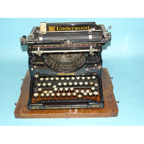 317 - An Underwood Standard Typewriter No.5, with Rexine (a/f) and tinplate covers.