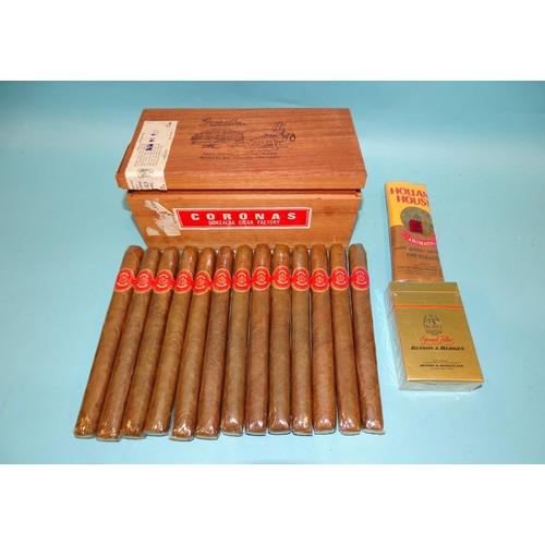 319 - A box of thirteen Gonzalba (Philippines) Coronas cigars, box dated Feb. 16 1978, a small pack of Hol... 