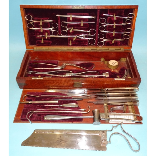 329 - Henry Lewis, London, a surgical instrument set, including amputation saws, trepanning bits, catheter... 