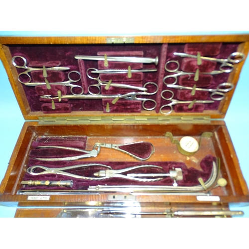 329 - Henry Lewis, London, a surgical instrument set, including amputation saws, trepanning bits, catheter... 